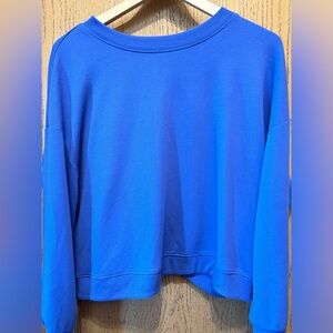 Vibrant purple exercise sweater